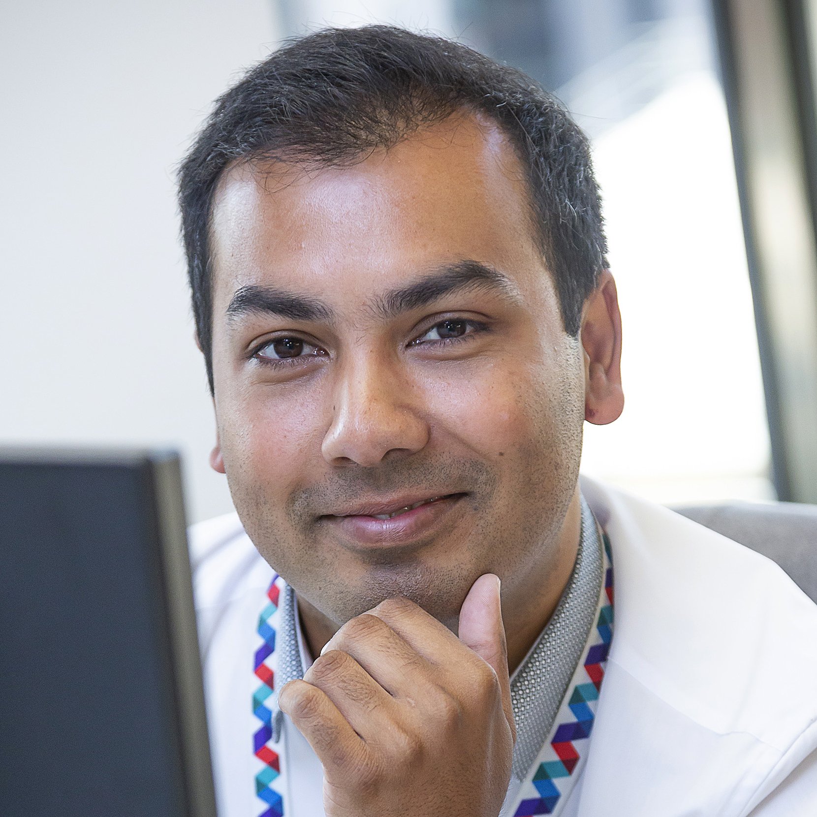 Commercial Portrait of man at a desk