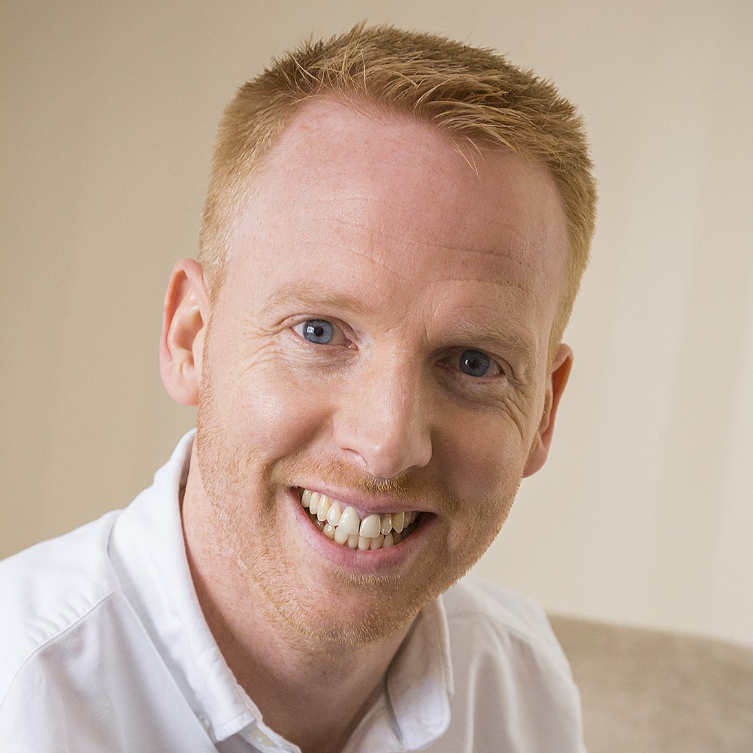 Headshot of smiling man